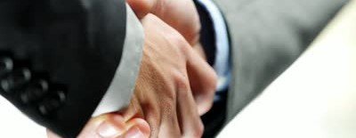 stock-footage-business-handshake-two-businessman-shaking-hands-closeup-motion-track-high-definition-400x155